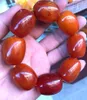 Strand Hoo 25x33mm BEAUTIFUL RED BALTIC AMBER Old Beeswax Drum Bead Bracelet Certificate