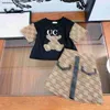 New kids dress summer Two piece suits Little Bear Pattern child tracksuits Size 110-160 CM T-shirt and Grid letter printed short skirt 24Mar