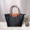 Womens Fashion Large Tote Bag Brand Designer Handväskor Ekologiska shopping axelväska enkel casual klimpväska underarmsäck 10A