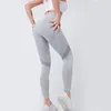 Pantaloncini attivi Leggings senza cuciture Pantaloni sportivi lunghi da donna Allenamento in palestra Pantaloni elasticizzati da yoga in rete a vita alta da donna attillati sui fianchi color pesca