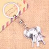 Keychains 20pcs Fashion Keychain 37 31 Mm Big Ears Elephant Pendants DIY Men Jewelry Car Key Chain Ring Holder Souvenir For Gift