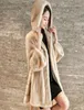 Cappotto in pelliccia sintetica Donna Nero Bianco Plus Size Giacche in pelliccia di cane procione allentate Nuova primavera Ufficio coreano Cappotti invernali con cappuccio LD777 2010299198860