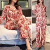 Kvinnors sömnkläder Kvinnor passar blommigt tryck pyjama set med långärmad topp breda benbyxor hemkläder lapelfickor för komfort