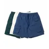 Herenshorts Melkwit Donkergroen Blauw 3 kleuren Casual Effen Multi Pocket Werk Kort Zomer Losse elastische taille