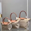 Tygväskor lyxiga kvinnors lyxiga designermärke S-klass handväska högkvalitativ stor damer på väskor kvinnliga axelhandväskor