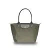Moda lüks markalar bayanlar çanta trend basit gündelik büyük kapasiteli hamur tatlısı şekilli naylon omuz çantası