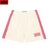 Designer Eric Emmanuels Mens Eric Shorts Mesh trou de basket-ball respirant Pantalon de plage en plein air