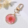 Keychains Pressed Natural Real Dried Flower Daisy Daffodils Blossom Petal Resin Pendant Key Chain Metal Rotationable Ring Holder