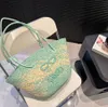 Borsa di paglia con cestino di design Borse per la spesa alla moda Borse da spiaggia Borsa da spiaggia aperta a tracolla intrecciata a mano di design Borsa estiva da donna di alta qualità