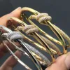 Designer tiffay en co armband knoopproduct met diamant V goud ontwerp geavanceerde persoonlijkheid vlindertouw omwikkeld