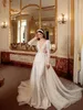 Robe de mariée sirène élégante en dentelle et perles, col en V, manches longues, broderie, dos nu, train en tulle sliky amovible, robes de mariée 2 en 1