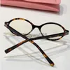 Luxe ontwerpers zonnebrillen voor heren dames Miao Family Brilmontuur Zonnebrillen Sterstijl Dezelfde stijl Elliptische zonnebril SMU04Z