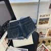 Pantaloncini da donna in denim estivo per donna con pantaloni Jean con bordo arricciato a vita ultra bassa