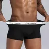 UNDUPTS 4pcs/lot erkek iç çamaşırı moda boksör düz renk seksi erkek boksör şort rahat nefes alabilen kalça asansör iç çamaşırı erkekler için