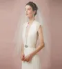 Ivory Fingertip Length Bridal Veils Soft Nylon Tulle Wedding Veil Raw Cut 70quot Diameter Single Layer Circle Veil With Comb Lon8447253