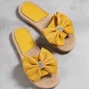 Slippers خط واحد من النعال النسائية القنب حبل الحبل المنسوج الصيف القوس الماس في الهواء الطلق جديد يرتديها من الخارج مع غطاء كعب وحيد مسطح 240306