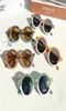 Kids039 Bloqueador solar Gafas de sol Leopardo Marco redondo Anteojos AntiUV al aire libre Playa Gafas de sol Niños Sombreros Moda Accessor1383041