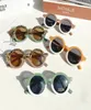 Kids039 Sunblock Sunglasses Leopard Round Frame Eyeglasses Outdoor AntiUV Beach Sun Glasses Children Headwear Fashion Accessor3615173