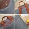 2024 Luxus Designer Frauen Handtaschen Geldbörsen Falten Wasserdichte Rucksack Vielseitig Hohe Qualität Outdoor Freizeit Tragbare Rucksäcke