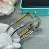 Designer Boutique Tiffay Lock Series Diamond Bracelet with Mens and Womens Open 18K Rose Gold U-shaped Head 1