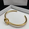 Simples designer atando pulseira pulseira manguito para mulheres moda ouro prata pulseira jóias de alta qualidade amantes do casamento presente
