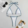 Kvinnors badkläder sexiga twopieces bikini set kvinnor slumpmässigt tryckt topp push up beach q240306