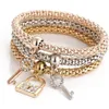 Bracelets de charme 3pcs / ensemble bracelet en cristal élastique coeur couronne arbre de vie Skl éléphant serrure à clé hibou charme chaîne bracelet ensembles pour femmes Dhk7O