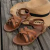 Slippare sommaren 2024 Kvinnor Strappy Sandals Flats Open-Toe Non-Slip Casual Shoes Roman Flat Sexig plus storlek