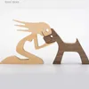 Objets décoratifs Figurines Nouveau type d'ornements en bois pour les maisons familiales de chiots et de sculptures en bois pour la décoration créative de bureau dans le nord de la Chine T240306