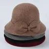 女性パーティーフォーマルヘッドウェアレディウィンターファッション非対称ボウノット100ウールフェルト帽子バケツボウラーキャップ240229