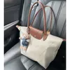 2024 Дизайнерская женская сумка через плечо в европейском стиле для отдыха, нейлоновая сумка с клецками, складная сумка через плечо с вышивкой, трехразмерная сумка для покупок