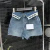 Odwrócone talia szorty dżinsy dla kobiet w talii krótkie spodnie Cool Girl Mini Denim Shorts Streetwear