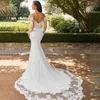 Seksowna sukienka ślubna syrenka 2024 Biała długie rękaw otwarte z tyłu koronkowe aplikacje ślubne SUKOL SZKOŁANIE