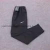 Summer Szybkie wysuszone cienkie sporty dla mężczyzn Student Fiess Training Pants