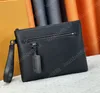 Nytt mode klassiskt lyxvarumärkesdesigner iPad Clutch Bag handväska kvinnor man retro stil läder handväskor kvinnor vintage koppling messenger väskor plånbok