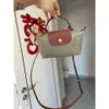 Dumpling Draagbare Tas Cosmetische Mode Franse Tas Mini Crossbody Dames Draagbare Handtas Met Eén Schouder