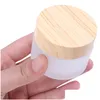 Wholesale 5G 10G 15G 30G 50G Frosted Glass Cream Bottle Refillable Jar Cosmetic Container With Imitated Wood Grain Lids Packaging Dro Dh4W8