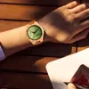 腕時計のクォーツクォーツウッディングメンズグリーンダイヤルのない数字のない時計ボーイフレンドレザーバンドピンバックル腕時計