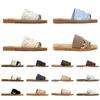 Chinelos Mulheres Woody Chinelos Mules Flat Marca Cloe Sandálias Luxo Slides Designer Canvas Branco Preto Vela Mulheres Moda Ao Ar Livre Praia Chinelo Sapatos