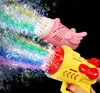 Gry nowatorskie Bubble Gun Electric Automatic So Rocket Bubbles Maszyna Kids Portable Outdoor Party Toy LED Light Blower Toys Prezenty 2207964959 Q240307