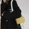 sac de téléphone portable exquis bande de chaîne mini petit sac sac tissé sac d'aisselle de sens avancé messager à bandoulière unique petit sac carré 240131