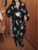 Sukienki imprezowe gaganiczne kobiety czarny kwiatowy nadruk v szyja 2024 Letni styl francuski delikatny a -linia samice samica