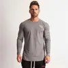 Jogger gimnasio correr entrenamiento algodón cuello redondo hombres camiseta de manga larga moda ropa de hombre Casual tendencia camisa de fondo