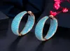 Hoop Huggie Cwwzircons lyxiga turkiska ljusblå kubik zirkoniums stora slinghopp örhänge för kvinnor mode uttalande smycken brinco1047019