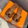 2024 Top Designer One Sandals Slipper Oranss New Lady Edition Spring H Family Sheepskin Early Macaron Series Versatile Flat Bottom Step Single Shoes Evla