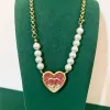 2024 czarny luksus łańcuch Naszyjnik butik Pearl Love Naszyjnik 18k złot