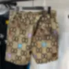 Herr shorts designer 2024 kvinnor sommar ny high end g familj jacquard gammal blomma neddy co-märkta modepar män och samma 55e FC99