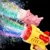 Gry nowatorskie Bubble Gun Electric Automatic So Rocket Bubbles Maszyna Kids Portable Outdoor Party Toy LED Light Blower Toys Prezenty 2207964959 Q240307