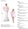 Eleganta applikationer spets älskling sjöjungfrun bröllopsklänning med axel korta ärmar trumpet brudklänningar med 3D -blommor glänsande applikationer