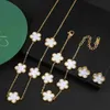 V bangle Stepping into a stainless steel clover necklace bracelet earrings three piece set vacuum electroplated non fading niche ladies